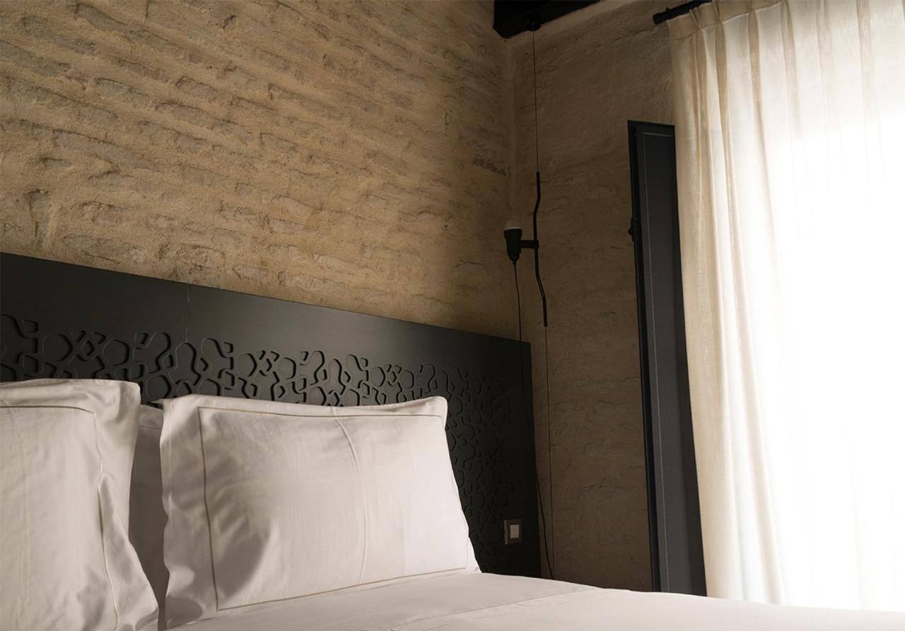Eme Catedral Mercer Hotel Seville Exterior photo A bedroom at the hotel